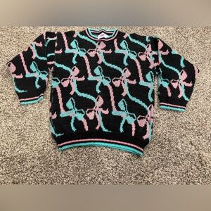 Vintage Made in the USA Metallic Black and Pink Bow Pattern Sweater